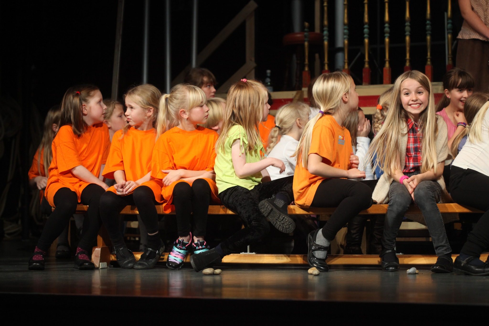 Young Jubilee Opera participants seated on stage