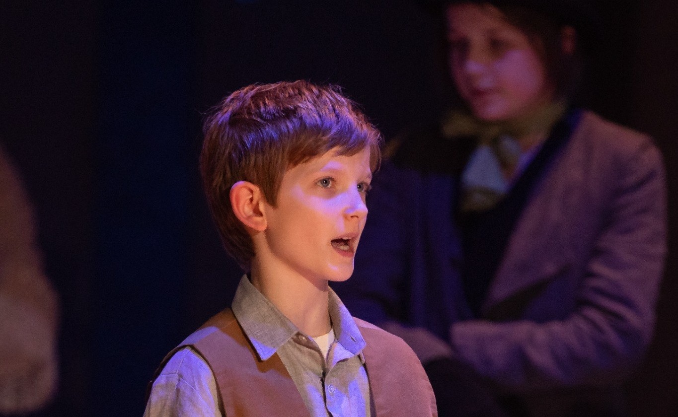 Young performer on stage